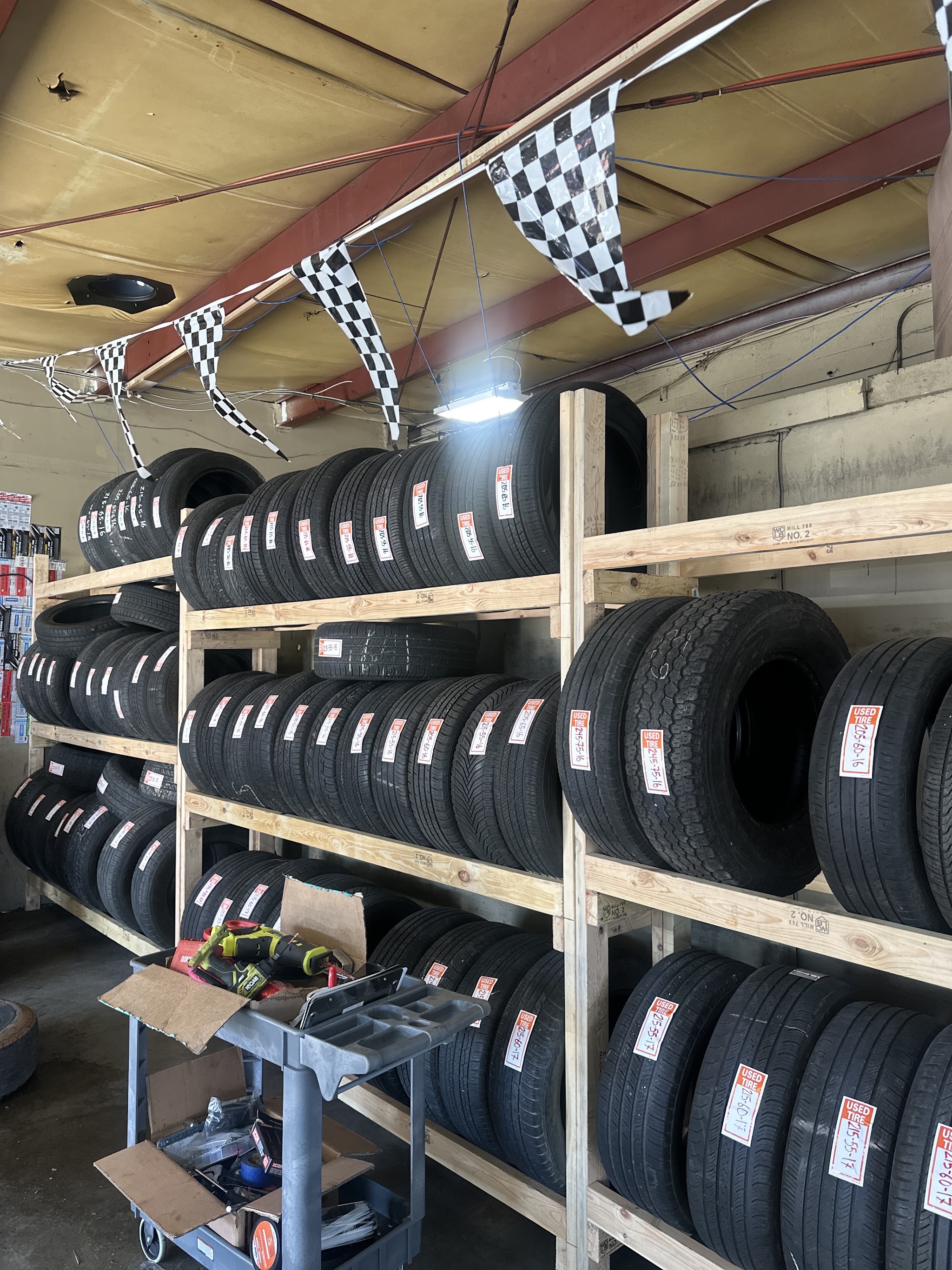 Racks of tires inside our shop